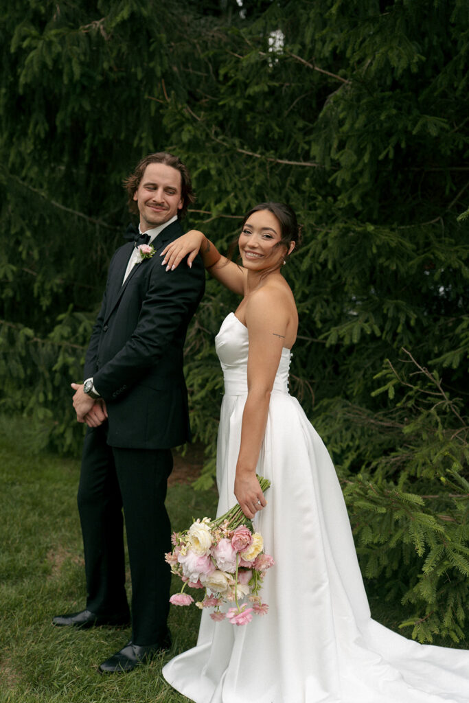 cute couple posing for the camera during their photoshoot