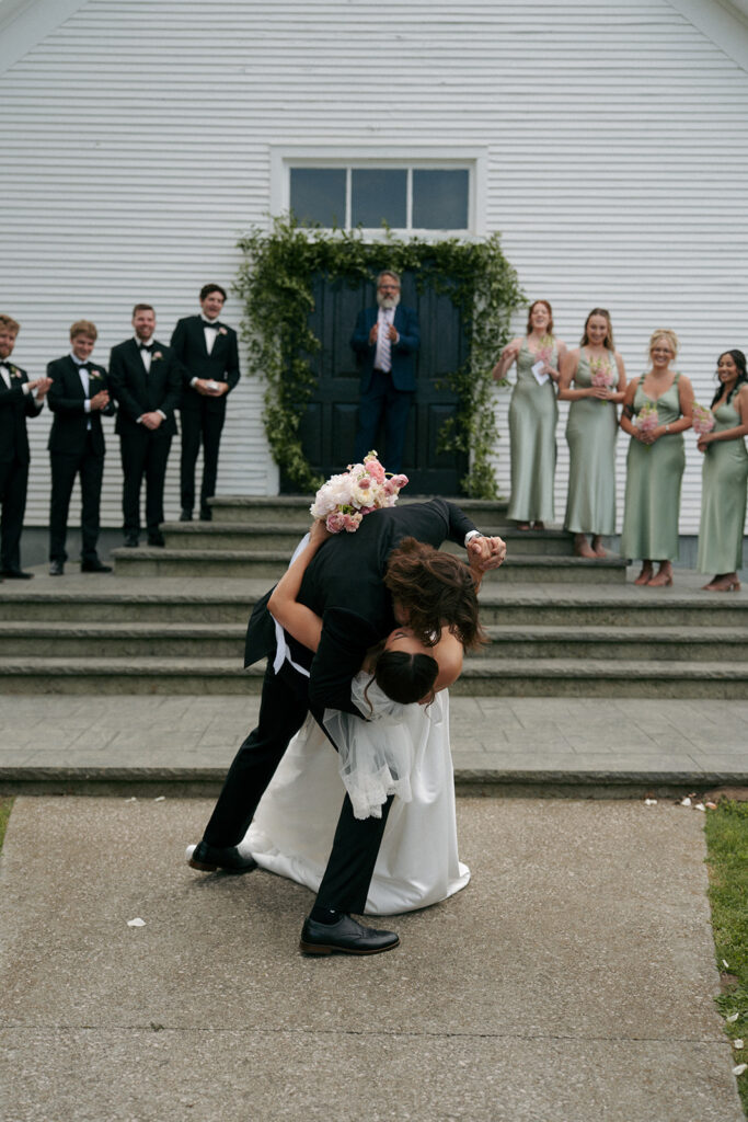 cute picture of the newlyweds kissing