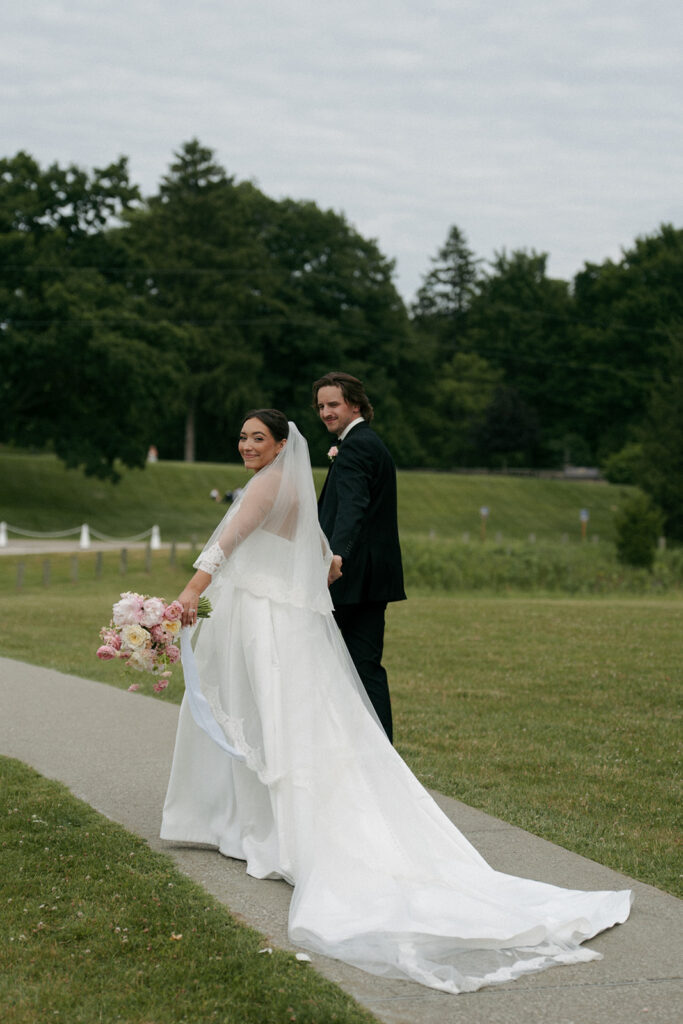 cute couple walking around their dream wedding venue