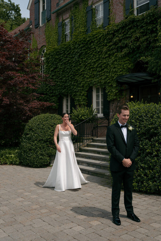 bride and groom at their first look