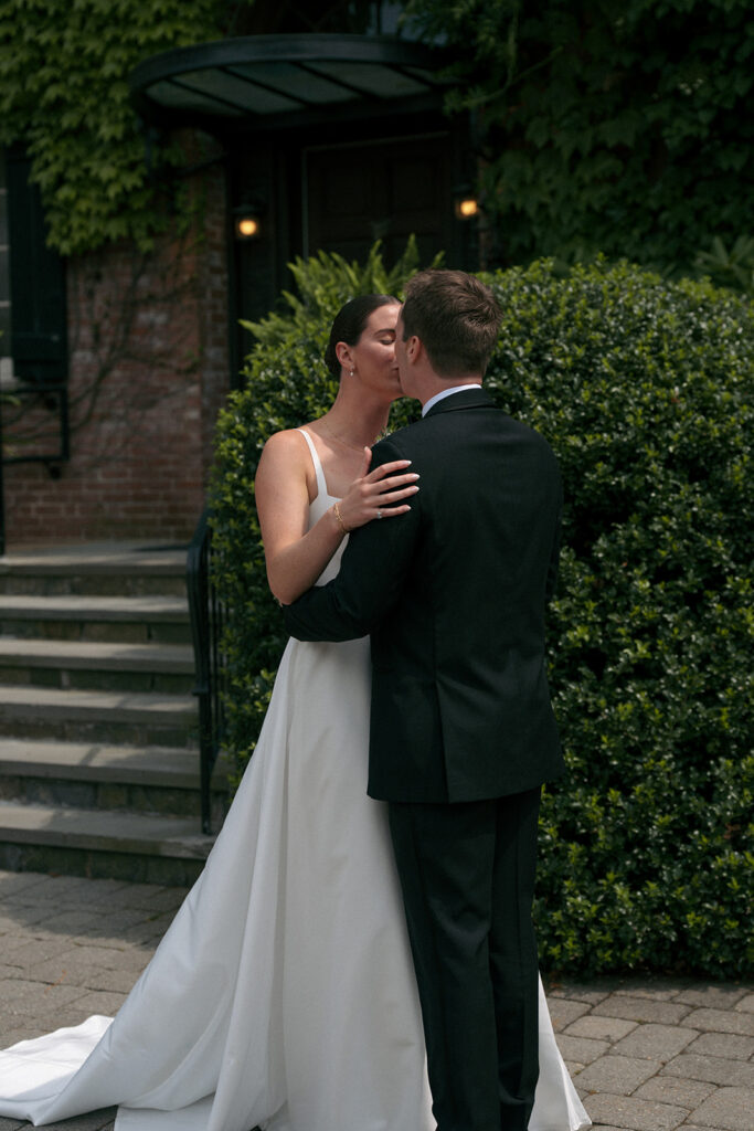 Picture of the bride and groom, kissing