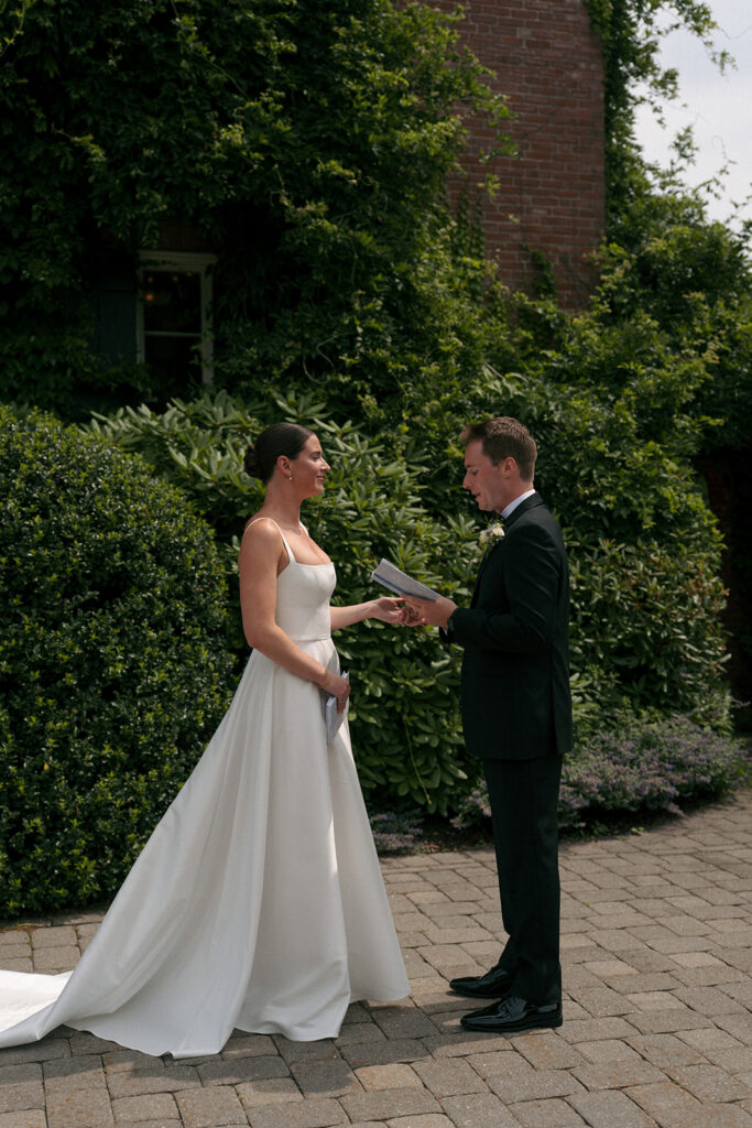 Bride and groom, reading their vows