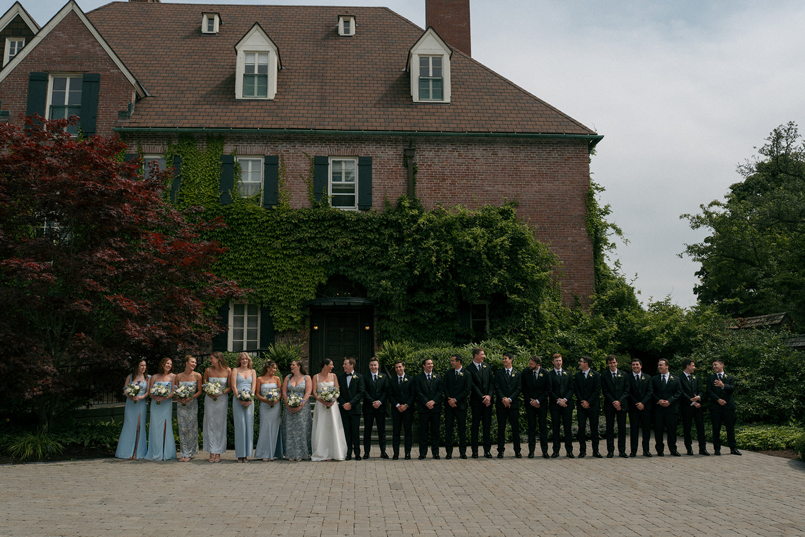 stunning picture of the bride and groom with their friends