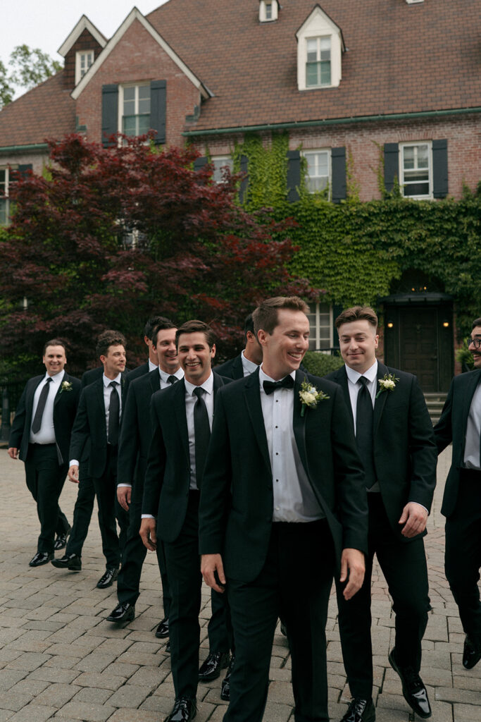 Groom and his friends laughing