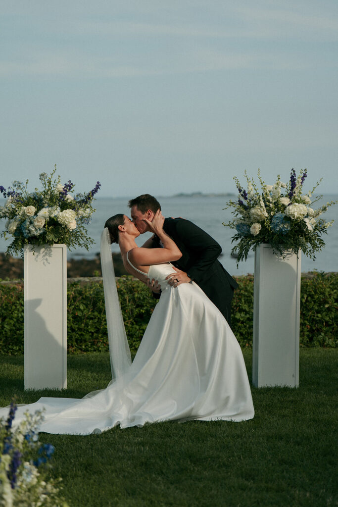 Couple kissing after their ceremony