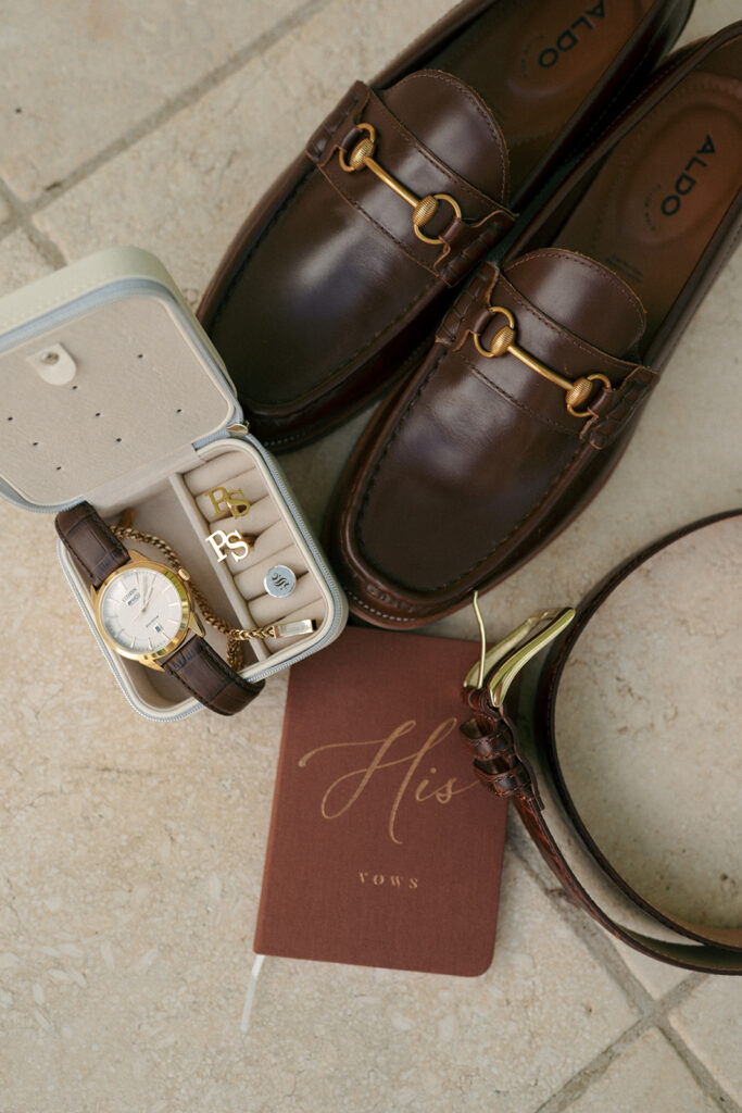 portrait of the shoes and watch the groom used on his wedding day