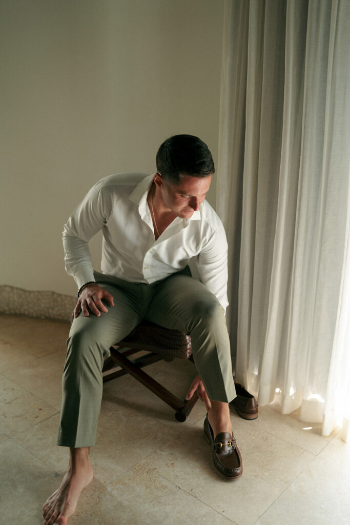 groom getting ready for his dream wedding day