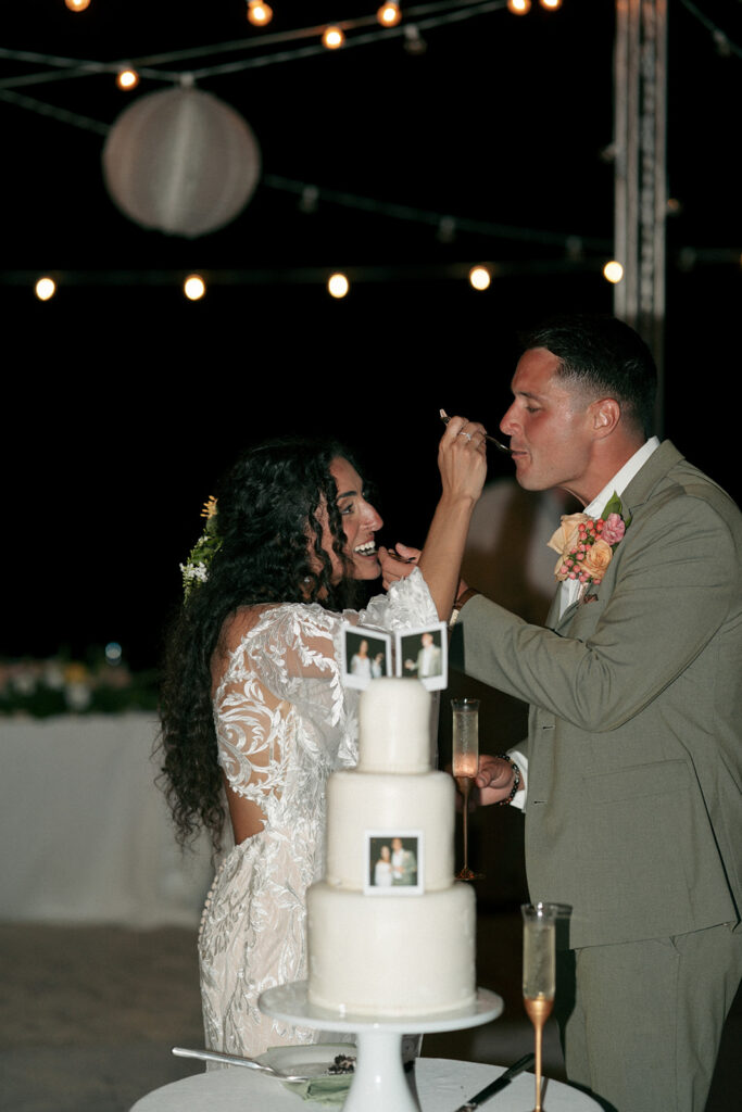 newlyweds cutting their wedding cake