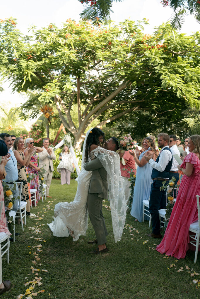 portrait of the newlyweds kissing
