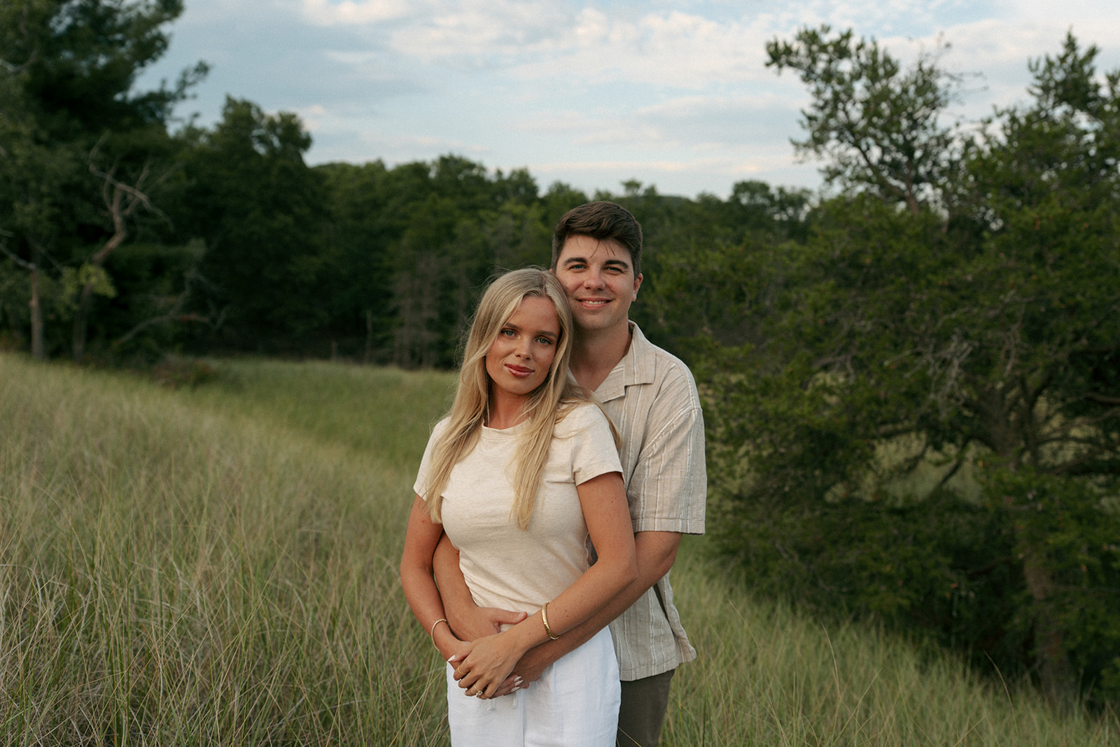 cute picture of the couple hugging during their photoshoot