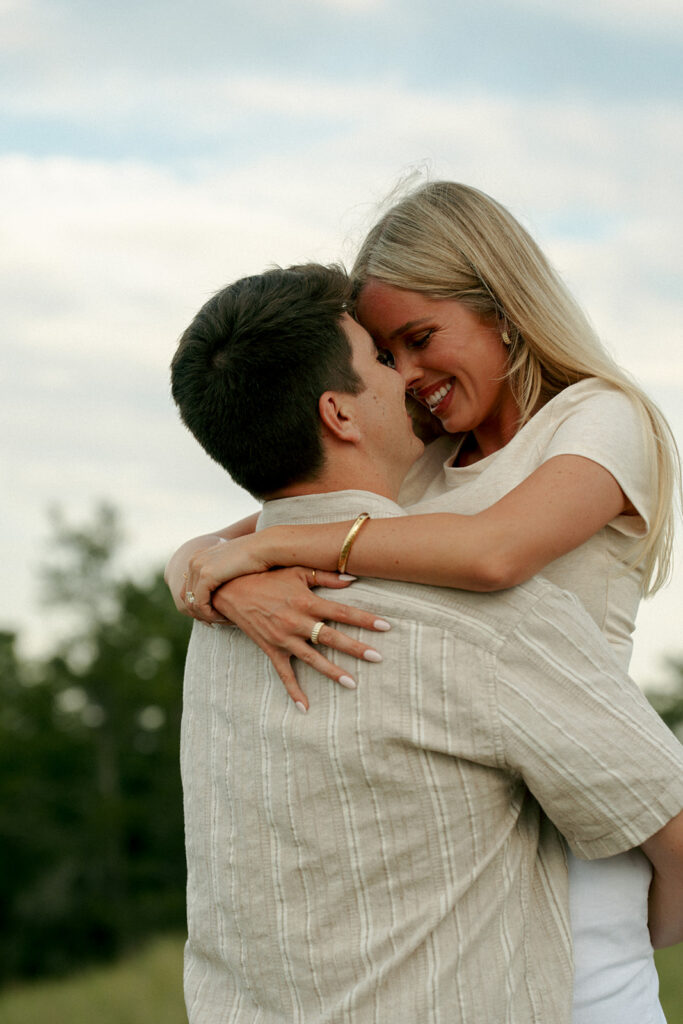 cute couple dancing during their photoshoot
