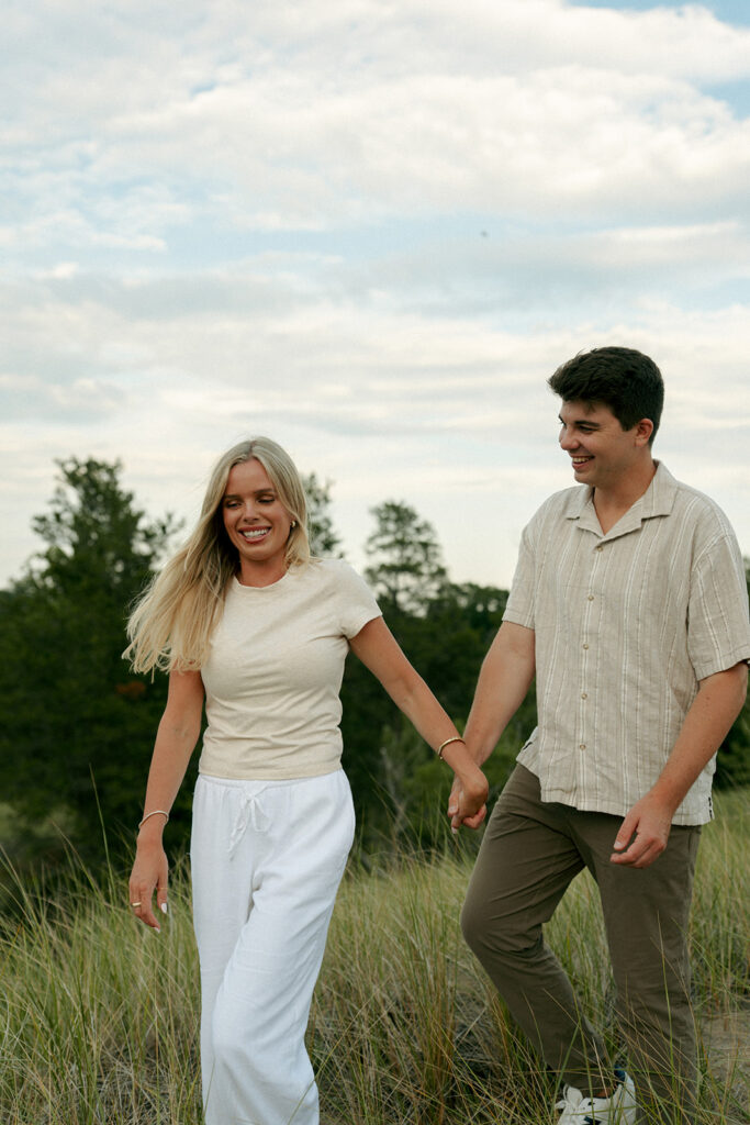 couple holding hands during their engagement session