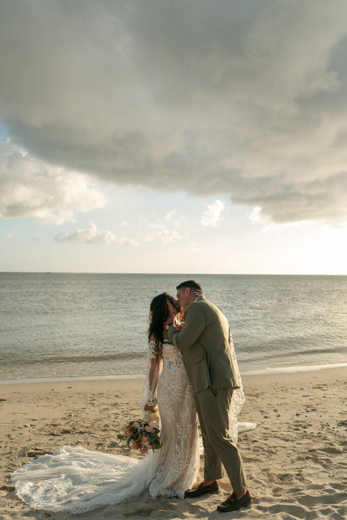 portrait of the newlyweds kissing