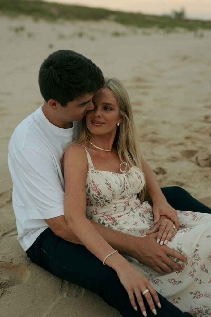 fiance kissing his fiance on the cheek