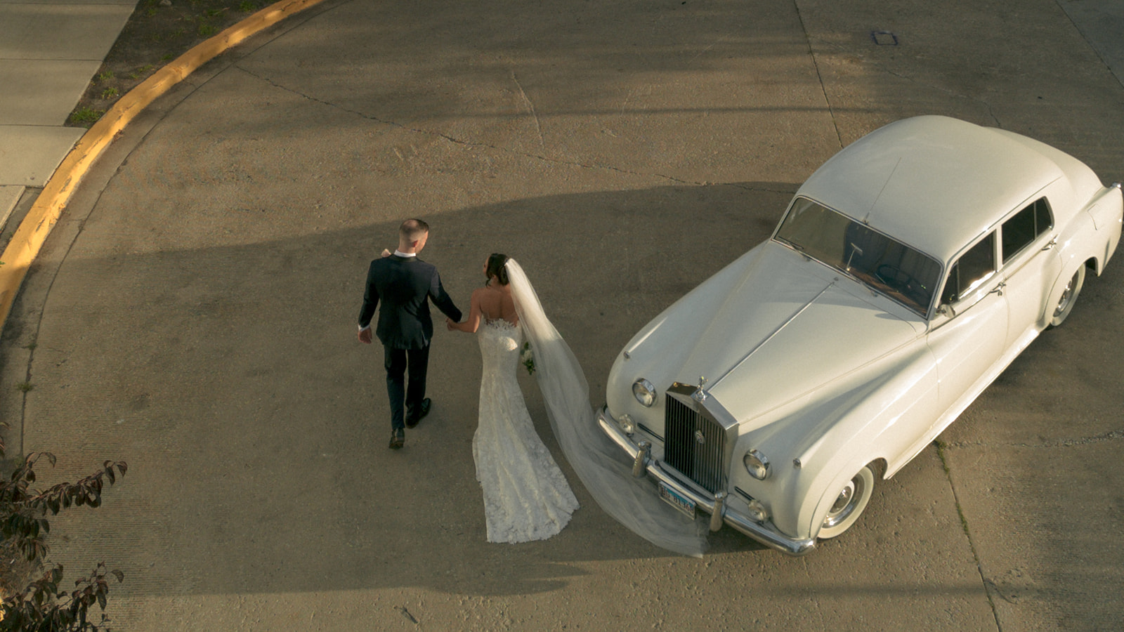 A Cinematic Ovation Chicago Wedding With Film Moments & a Vintage Rolls Royce