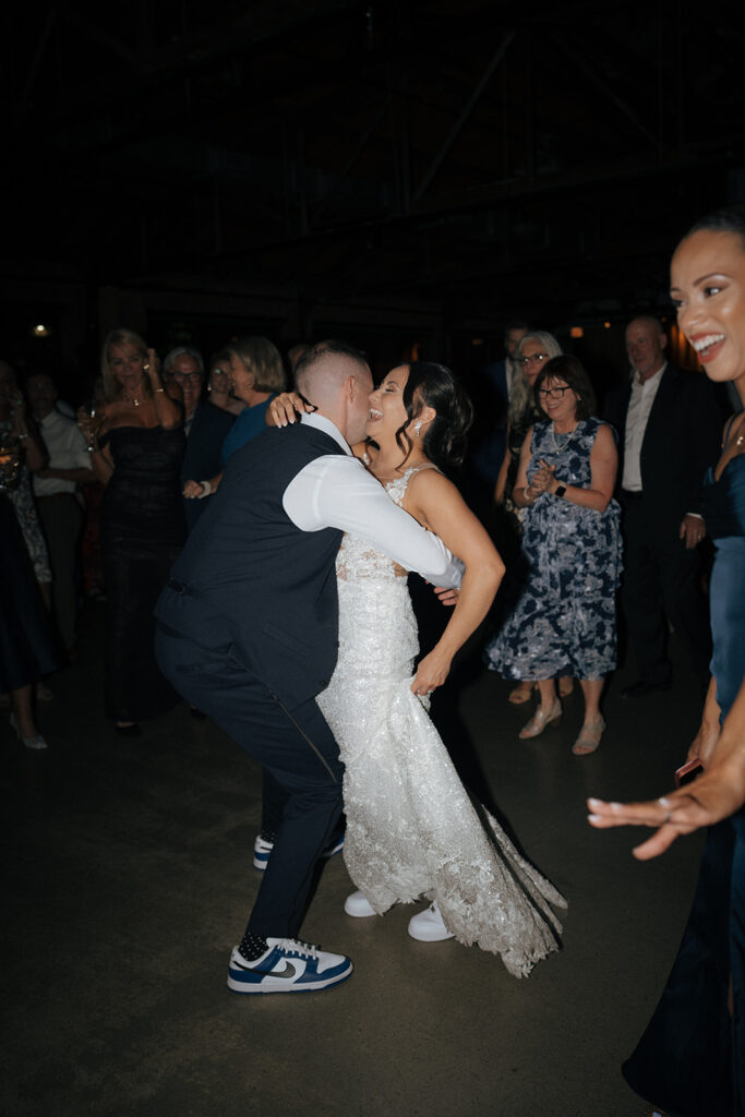 newly married couple dancing at their reception party