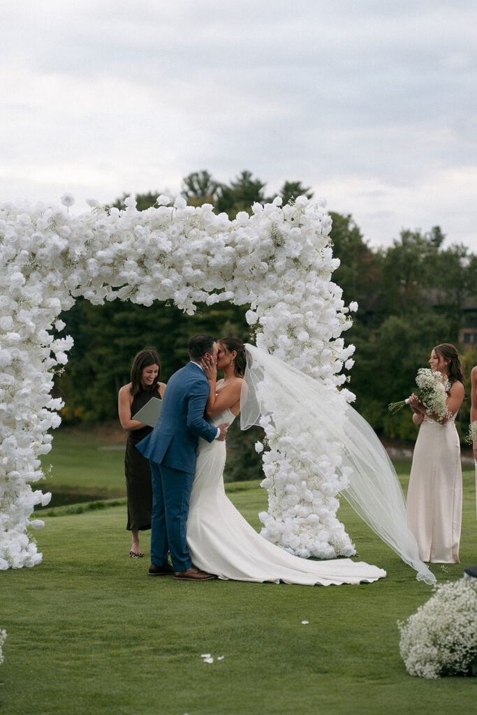 Bride and groom sharing intimate moment during Wabeek Club wedding reception in Detroit