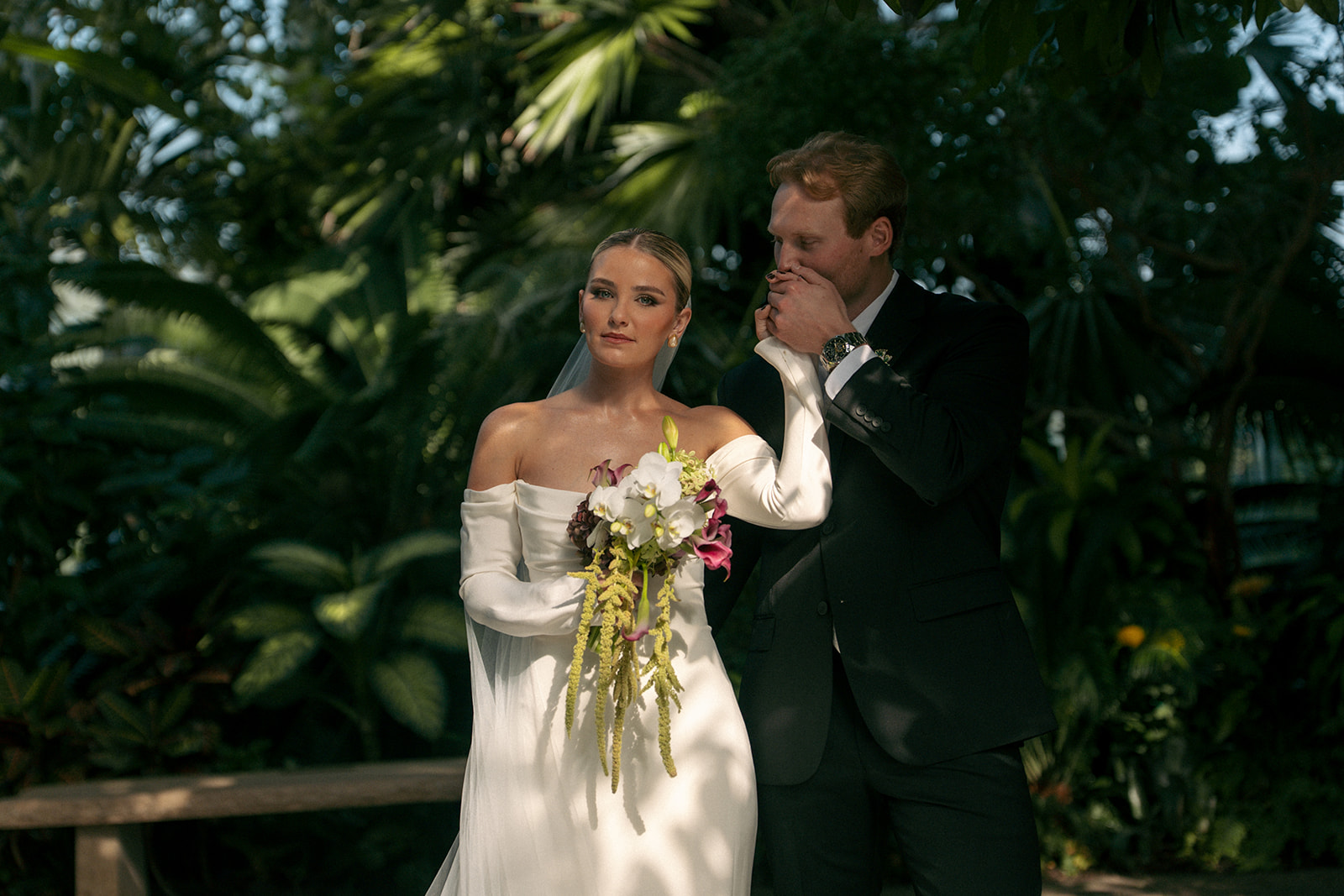 Wedding ceremony exit with flower petals at Fredrick Meijer Gardens Grand Rapids Michigan