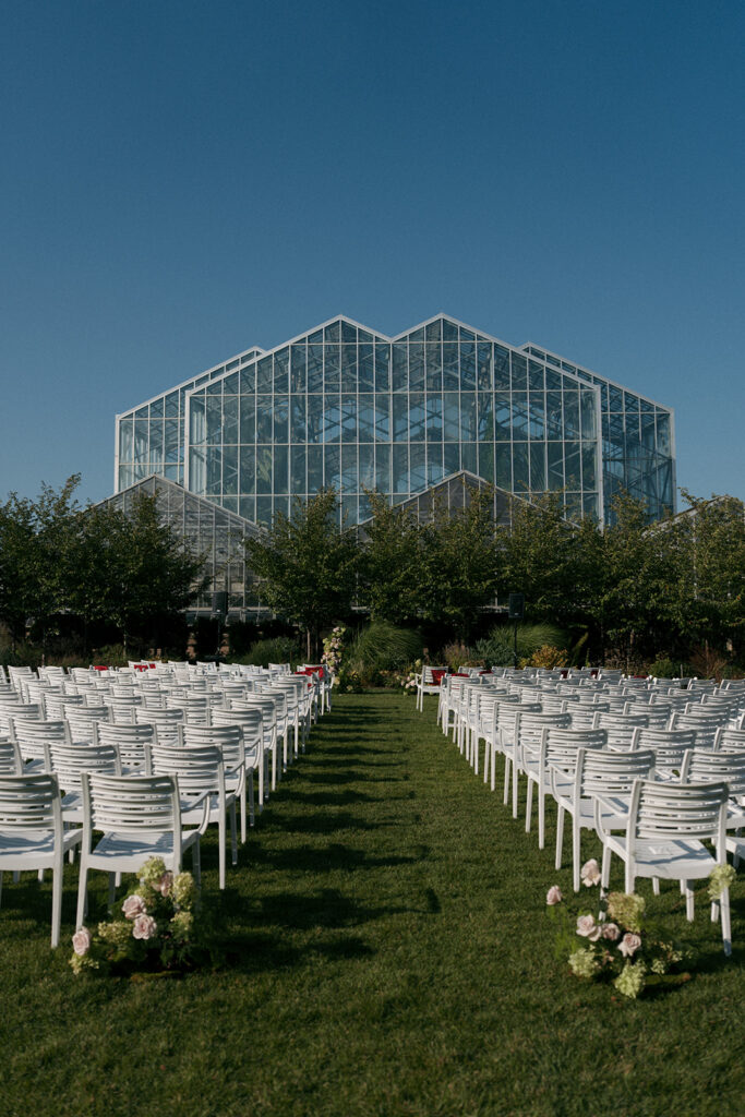 Bride walking down aisle Fredrick Meijer Gardens wedding