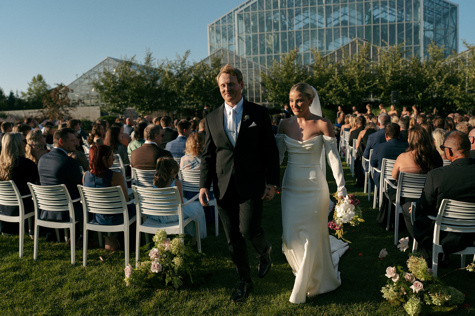 Cocktail hour setup with guests mingling at Fredrick Meijer Gardens wedding reception
