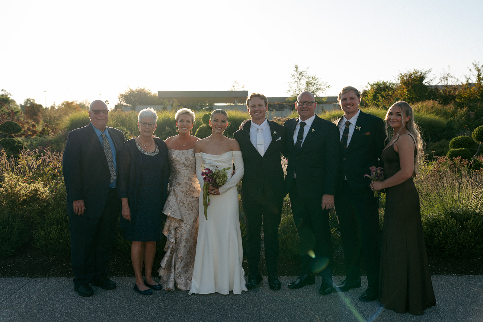 Wedding reception table settings with floral centerpieces at Fredrick Meijer Gardens
