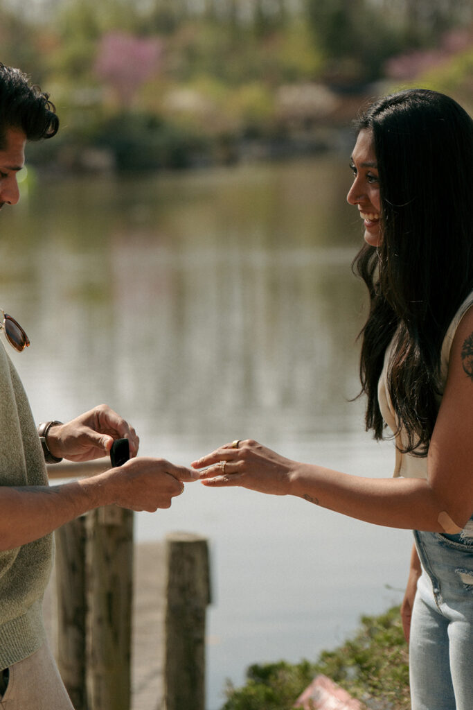 Bride-to-be showing engagement ring at Fredrick Meijer Gardens Grand Rapids
