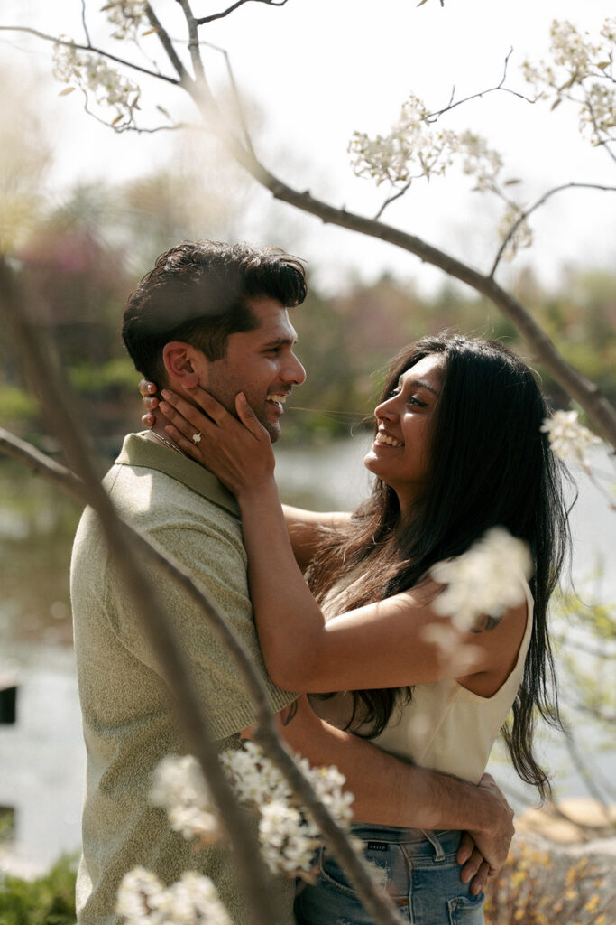 Sunset engagement photos at Meijer Gardens with couple silhouette Grand Rapids