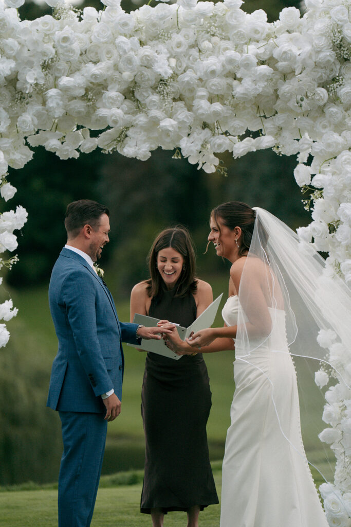 Luxury wedding sweetheart table with lush floral arrangements at Wabeek Club