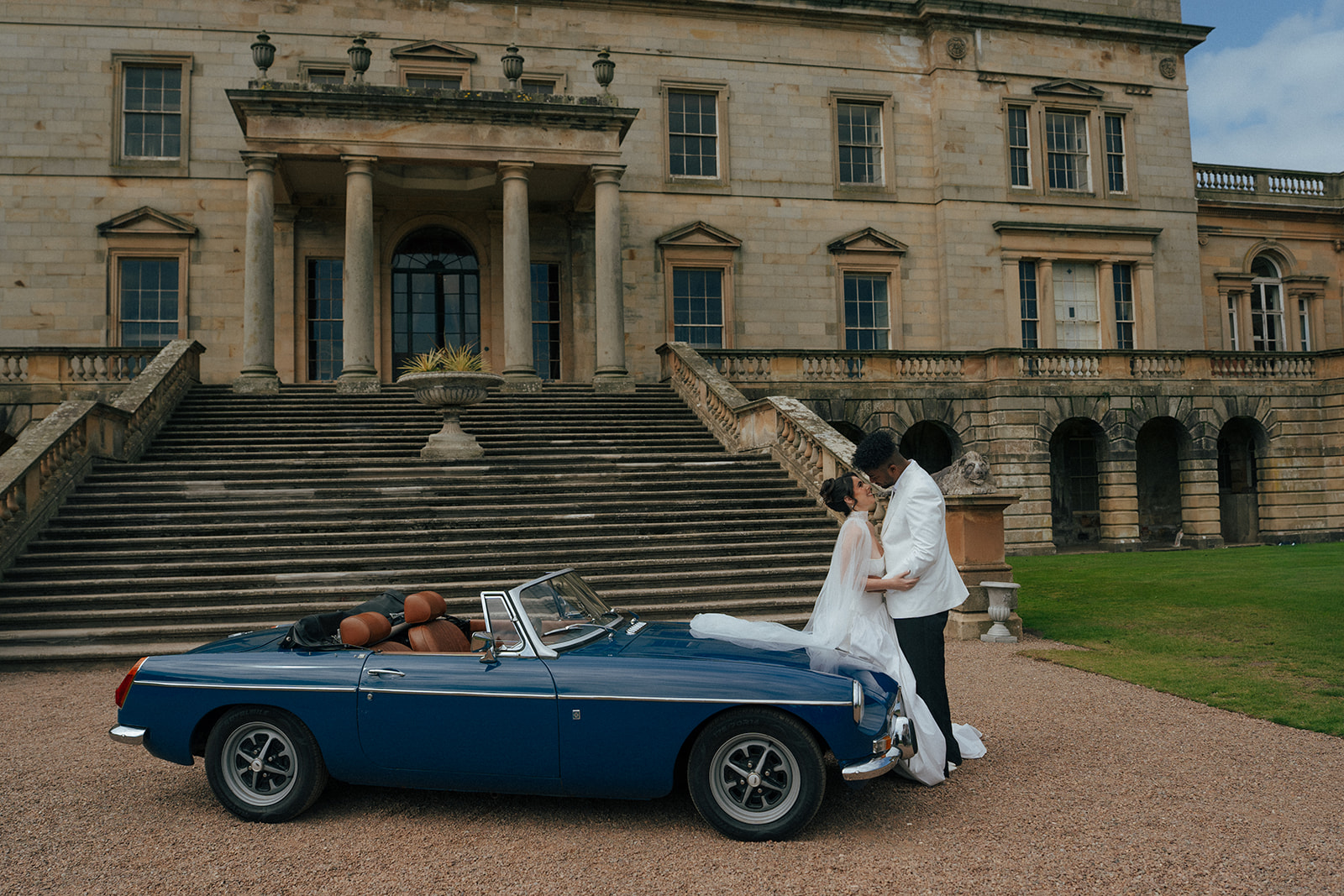 Elegant wedding tablescape with candlelight and floral arrangements at Gosford House Scotland