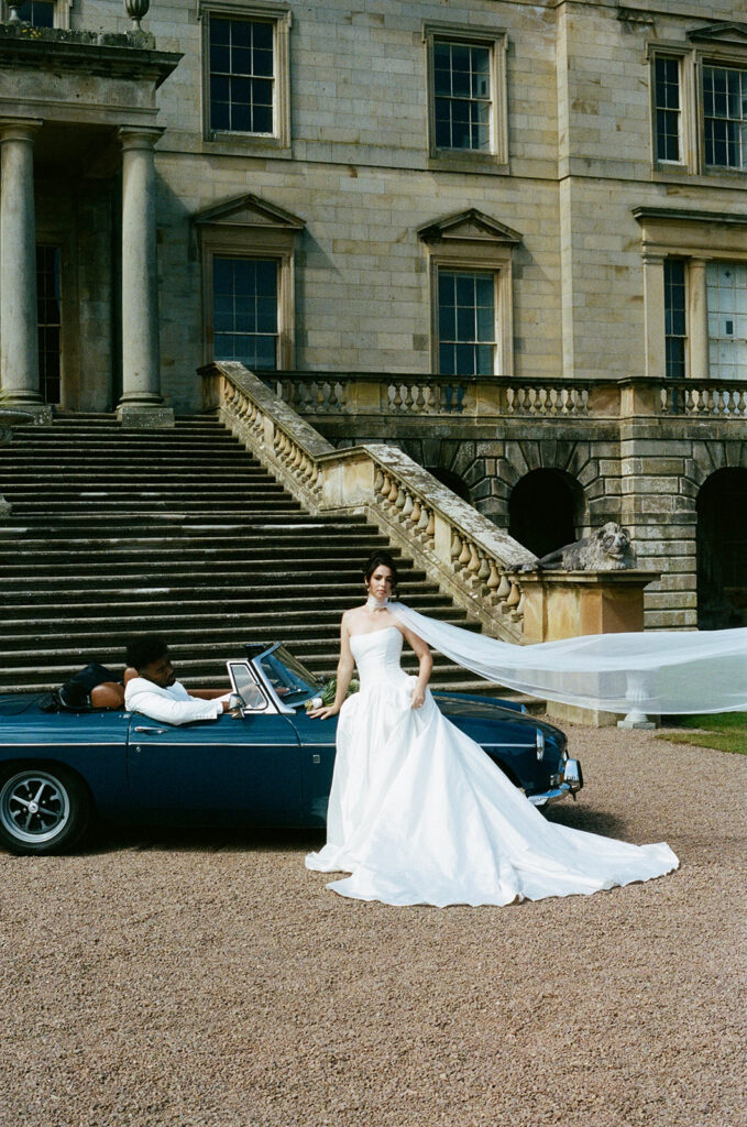 Sunset portrait of newlyweds on Gosford House estate grounds in Scotland